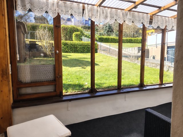 Wintergarten mit Blick in den Garten 2
