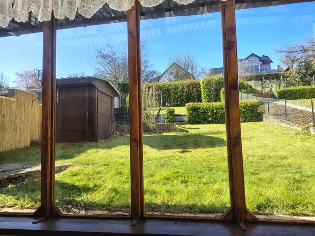 Wintergarten mit Blick in den Garten 4