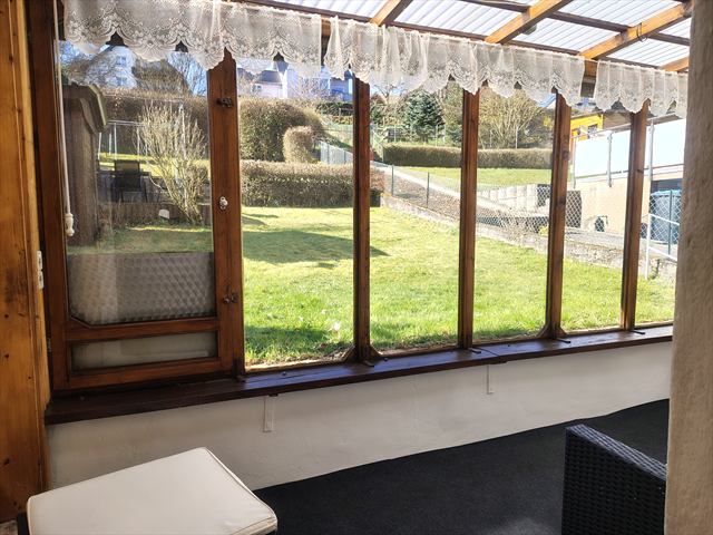 Wintergarten mit Blick in den Garten 2